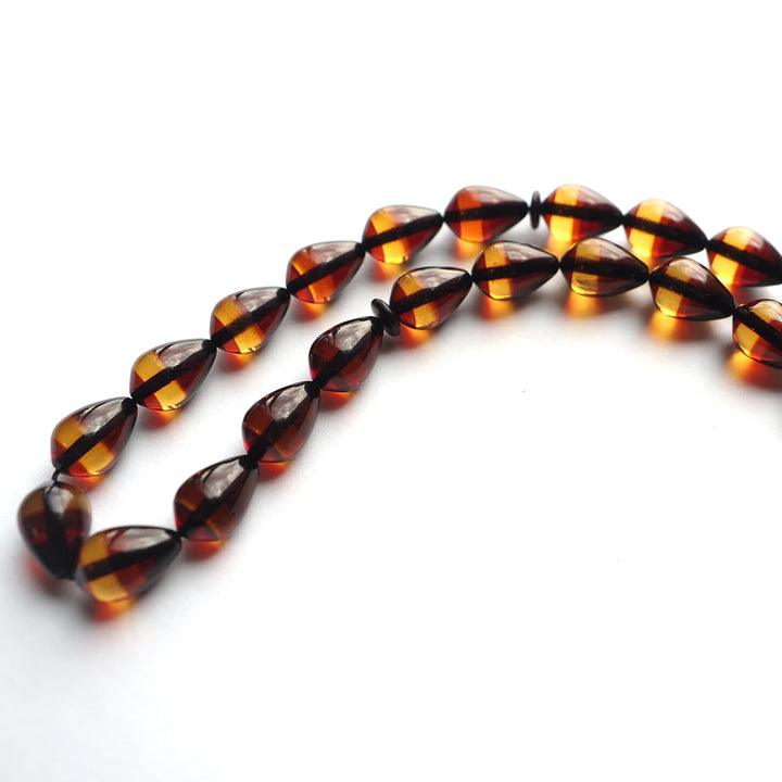 Silver Tassel Graded Pressed Fire Amber Tasbeeh – WATD127