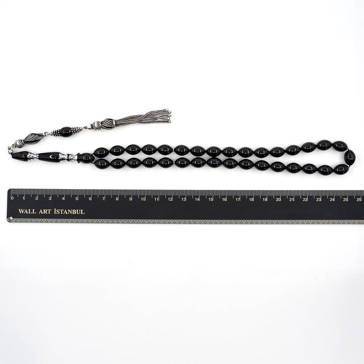 Premium Oltu Stone Tasbeeh Featuring Oval Cut Beads & Silver-Engraved Tassel – WATD402
