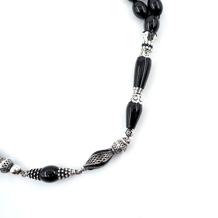 Premium Oltu Stone Tasbeeh Featuring Oval Cut Beads & Silver-Engraved Tassel – WATD402