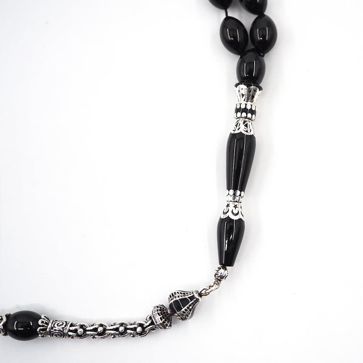 Premium Oltu Stone Tasbeeh Featuring Oval Cut Beads & Silver-Engraved Tassel – WATD407