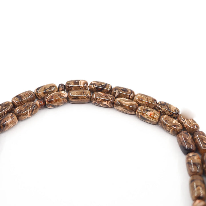 Capsule-Cut Countersunk-Drilled Catalin Tasbeeh with Silver Imam Bead – WATD422